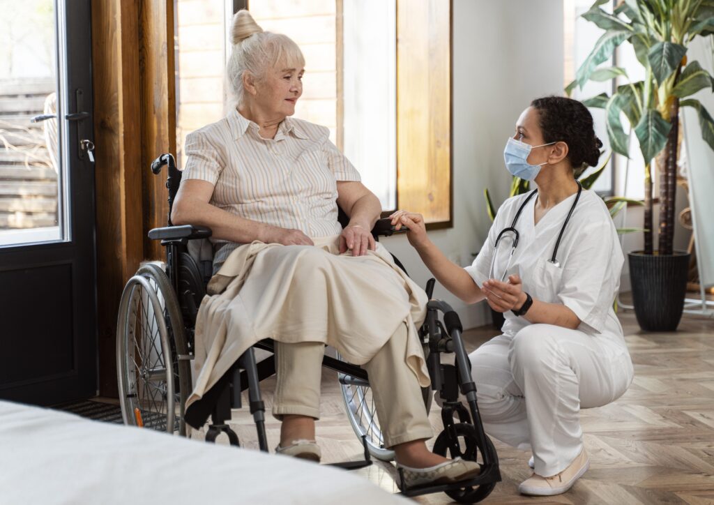 Doctor talking with her elder patient